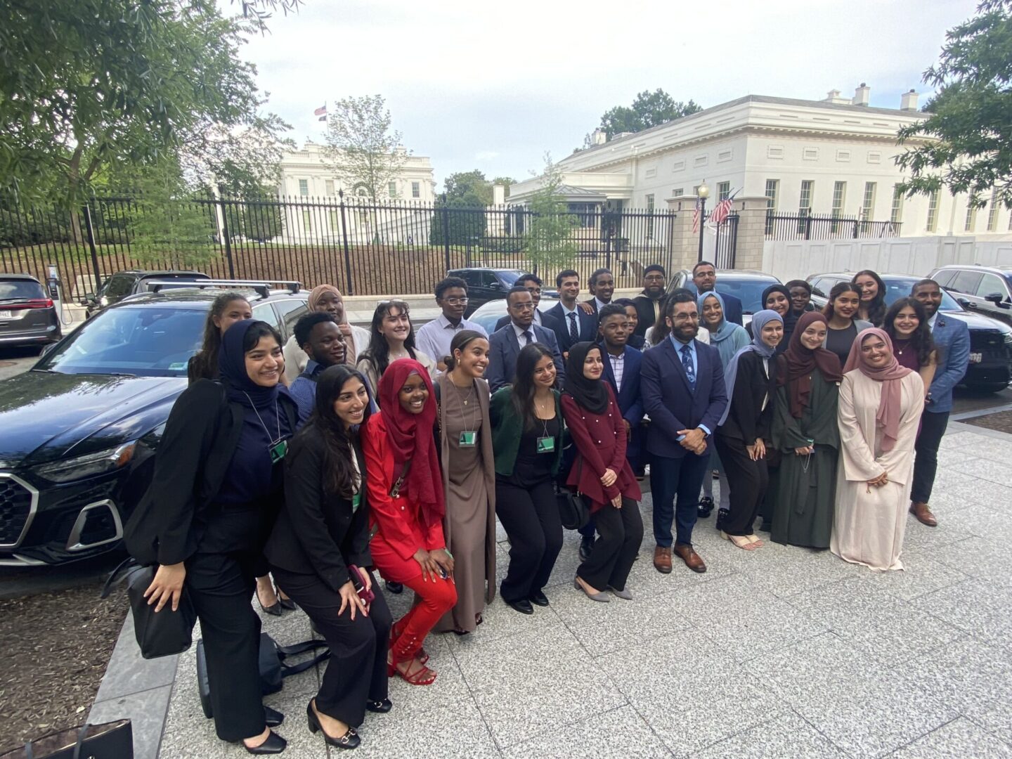 A group of people standing next to each other.